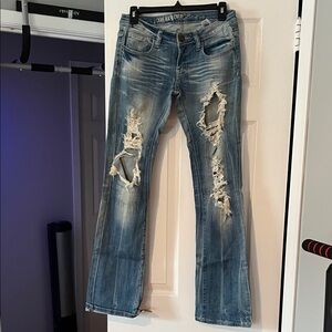 Distressed Boot Cut Jeans - Light Blue
